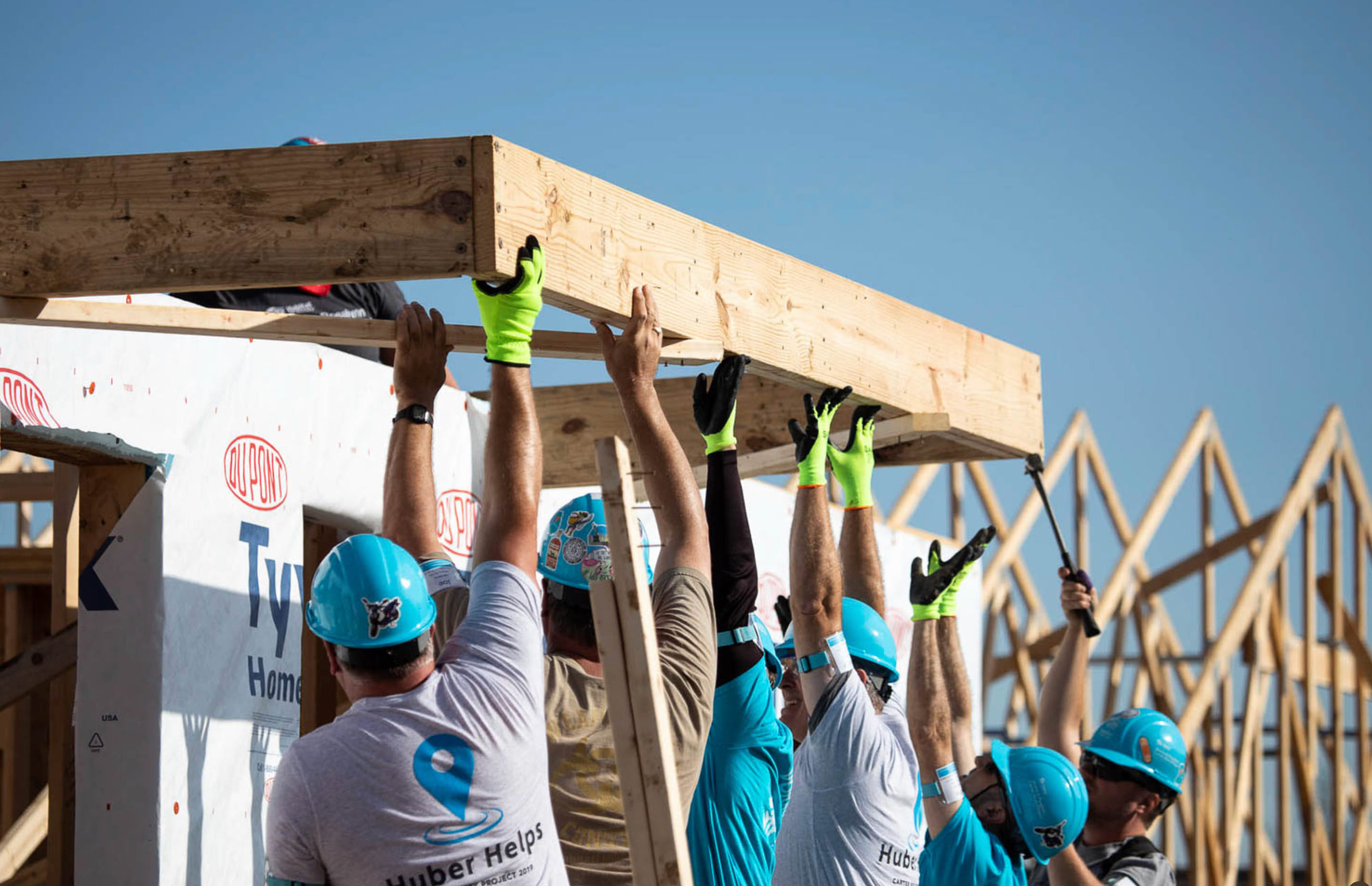 Volunteers building together